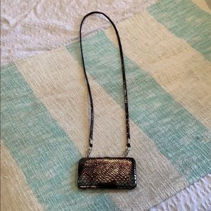 Small clutch with strap.